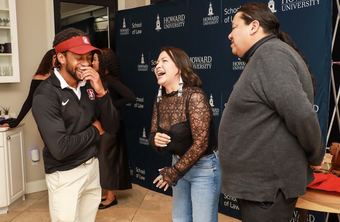 Participants sharing a conversation at Howard University School of Law